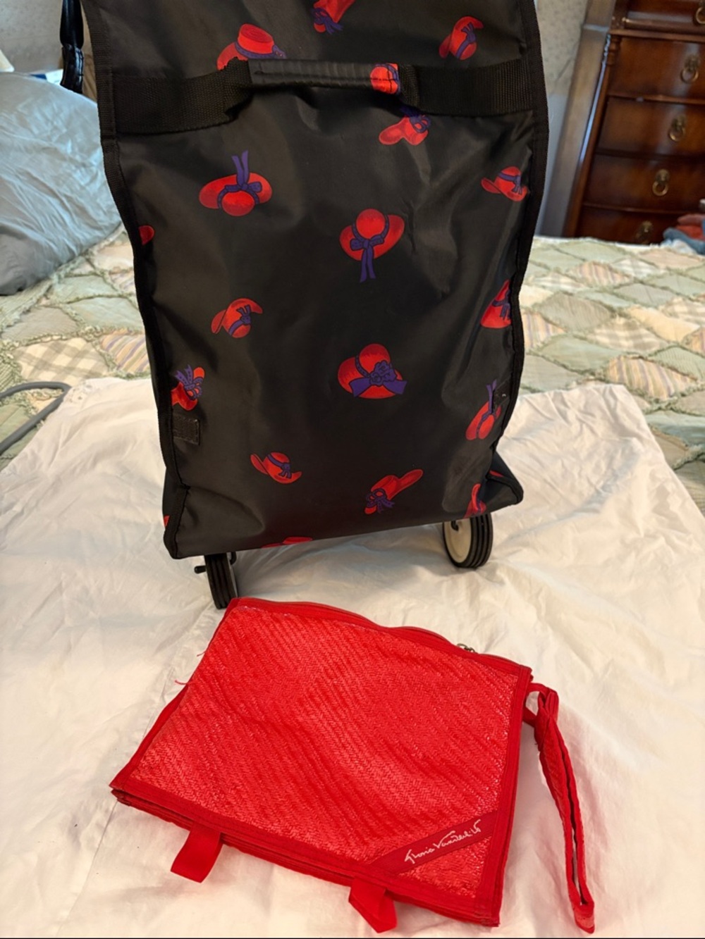 Source Unknown Black Travel Bag with Red & Purple Hat Print and Red Packing Cube